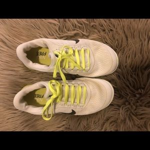 Nike free run shoes.